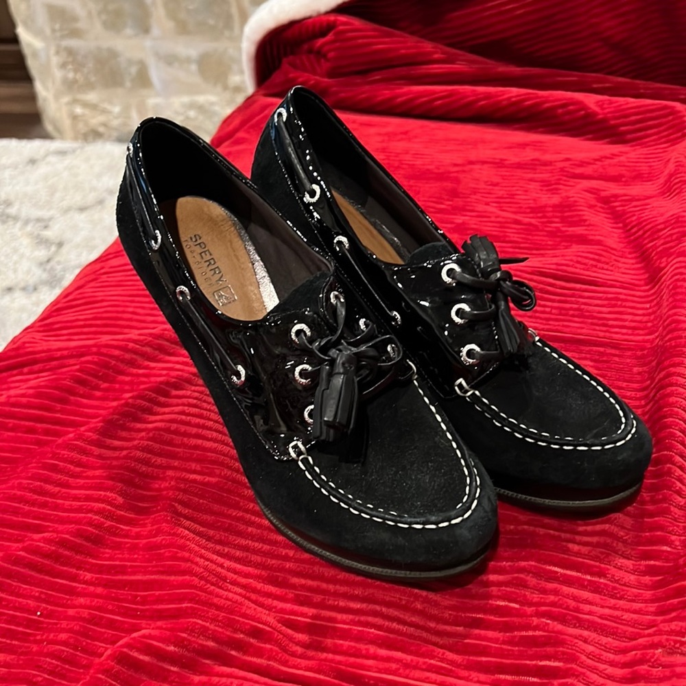 Sperry Top Sider black heeled loafer.